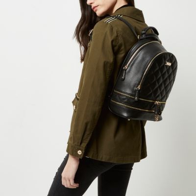 Black quilted zip backpack